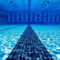 a swimming pool with a long line of water