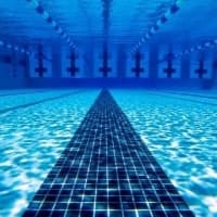 a swimming pool with a long line of water