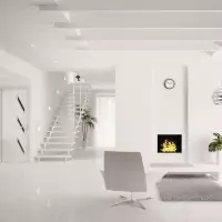 a white room with a fireplace and a chair