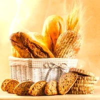 a basket of bread and breadsticks