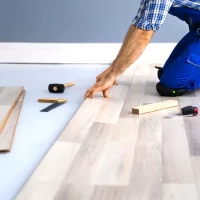 the floor of a home being worked on by a professional