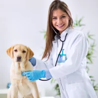 a woman in a white lab coat is petting a dog