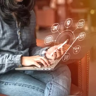 a person holding a cell phone in their hand