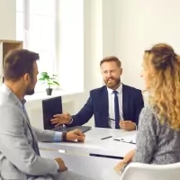 a business meeting with a man and woman